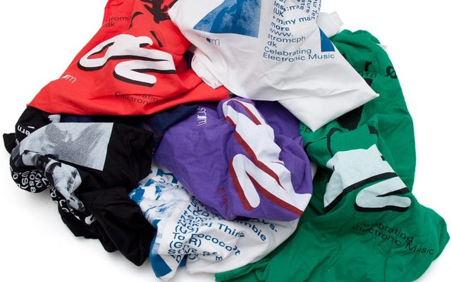 A pile of colorful logo tshirts