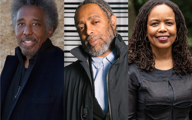 3 darker complexioned adults each wearing black smiling and looking at camera