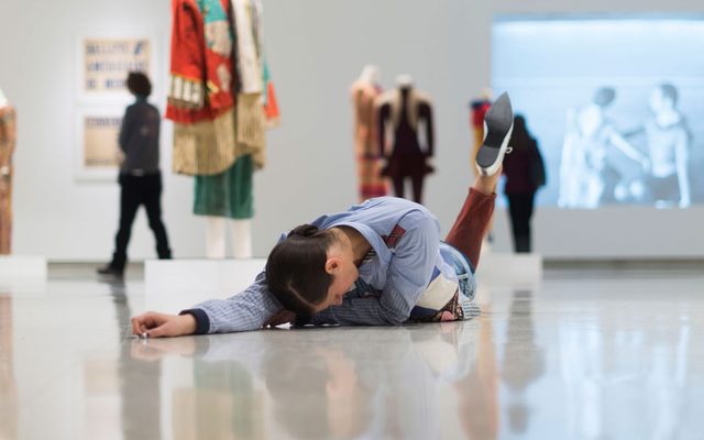 woman dancing in a gallery